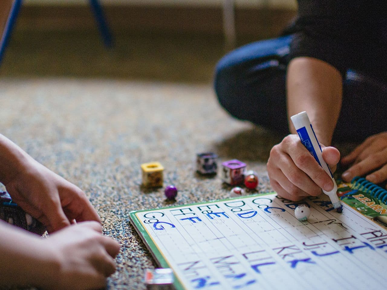 child practicing handwriting